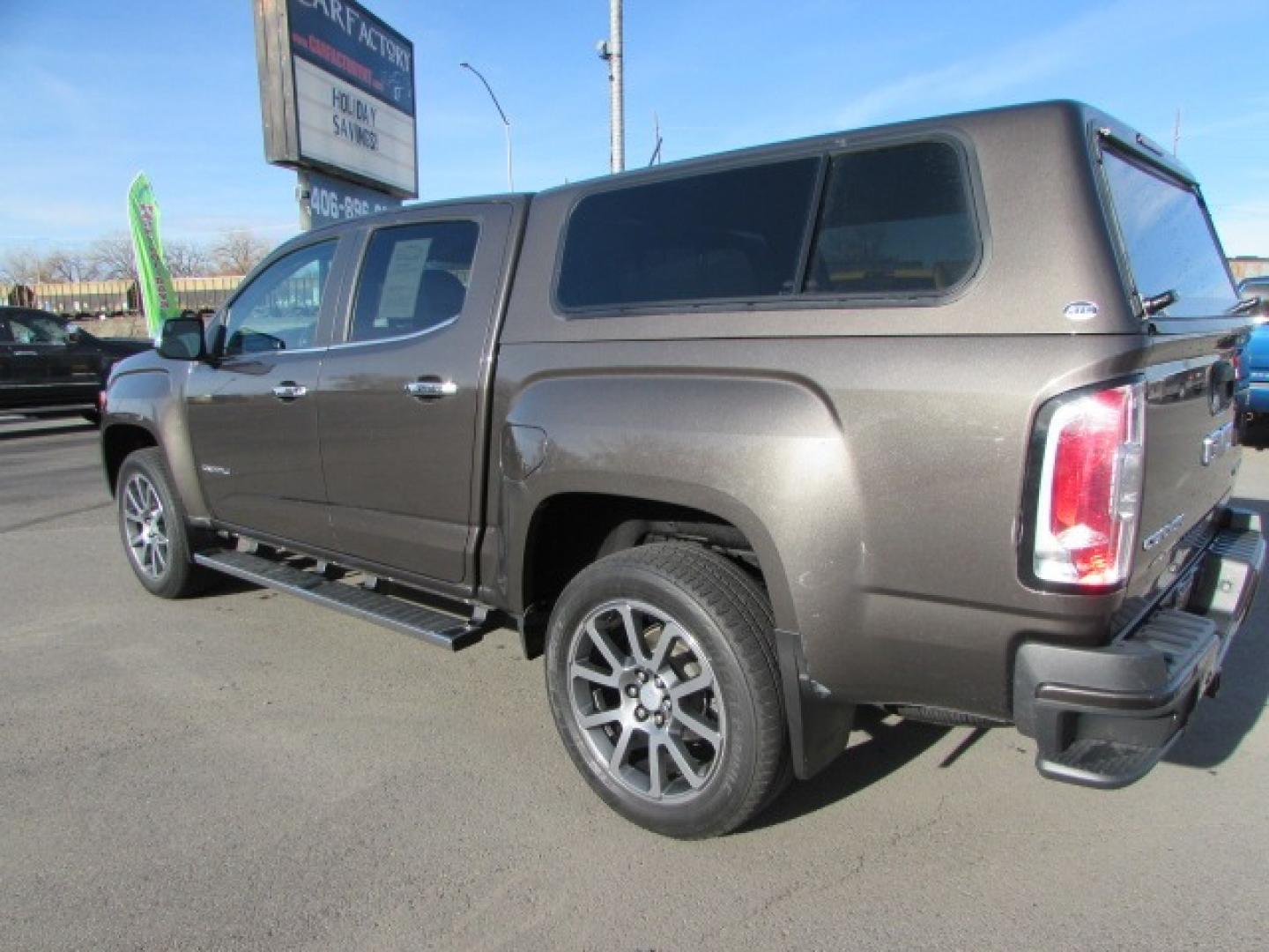 2019 Smokey Quartz Metallic /Gray Leather GMC Canyon Denali Crew Cab 4WD Long Box (1GTG6EEN6K1) with an 3.6L V6 DOHC 24V engine, 8A transmission, located at 4562 State Avenue, Billings, MT, 59101, (406) 896-9833, 45.769516, -108.526772 - Photo#1